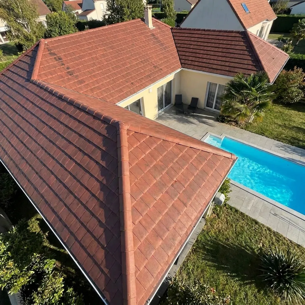 Toiture en tuiles plates rénovée à Montluçon